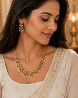 Premium Gold Plated Temple Necklace Set with Ruby, Green Stones & Pearl Drops